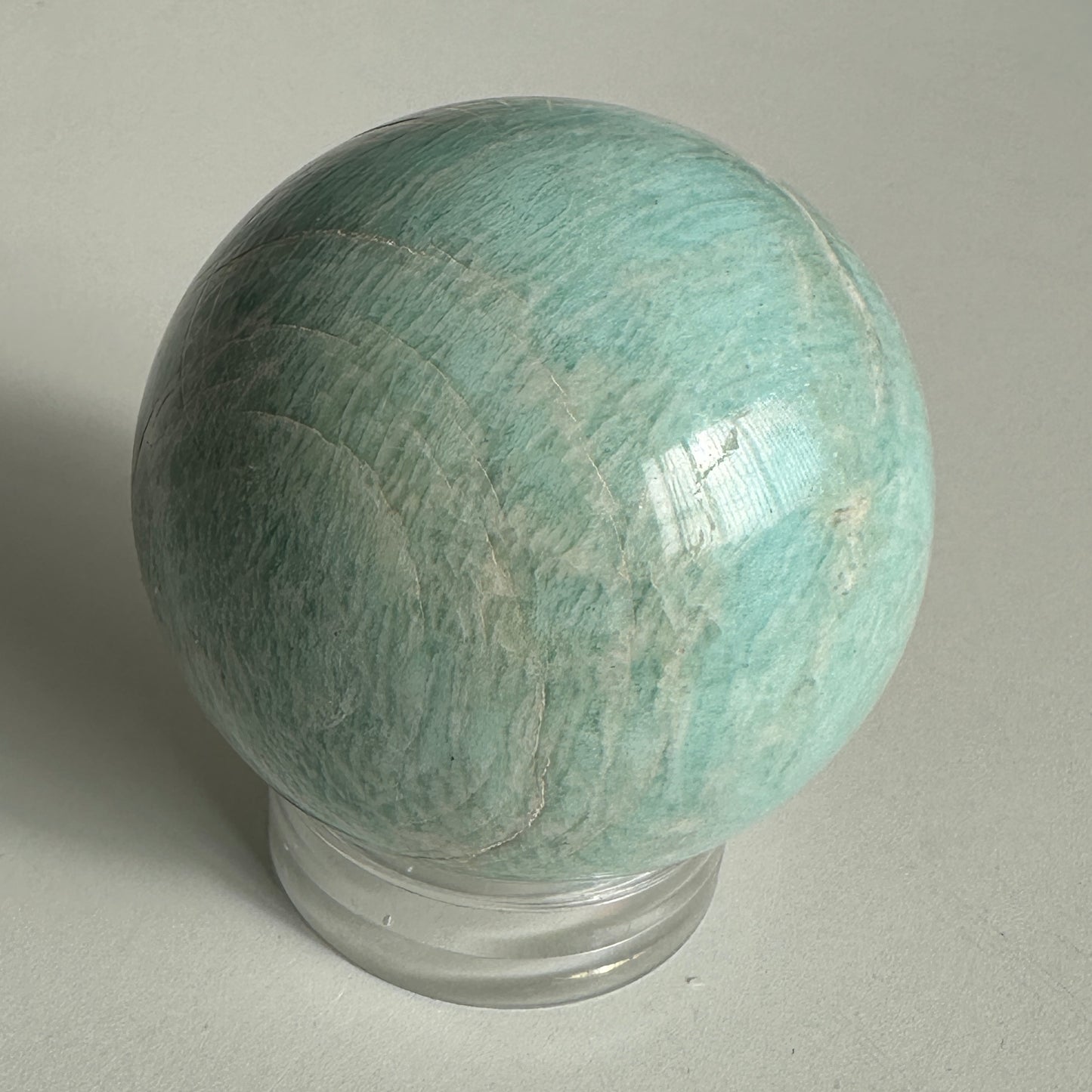 Vibrant 6.15cm Blue Green Amazonite Sphere from Brazil