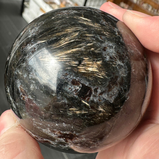 Radiant 6.80cm Astrophyllite and Garnet Sphere from India