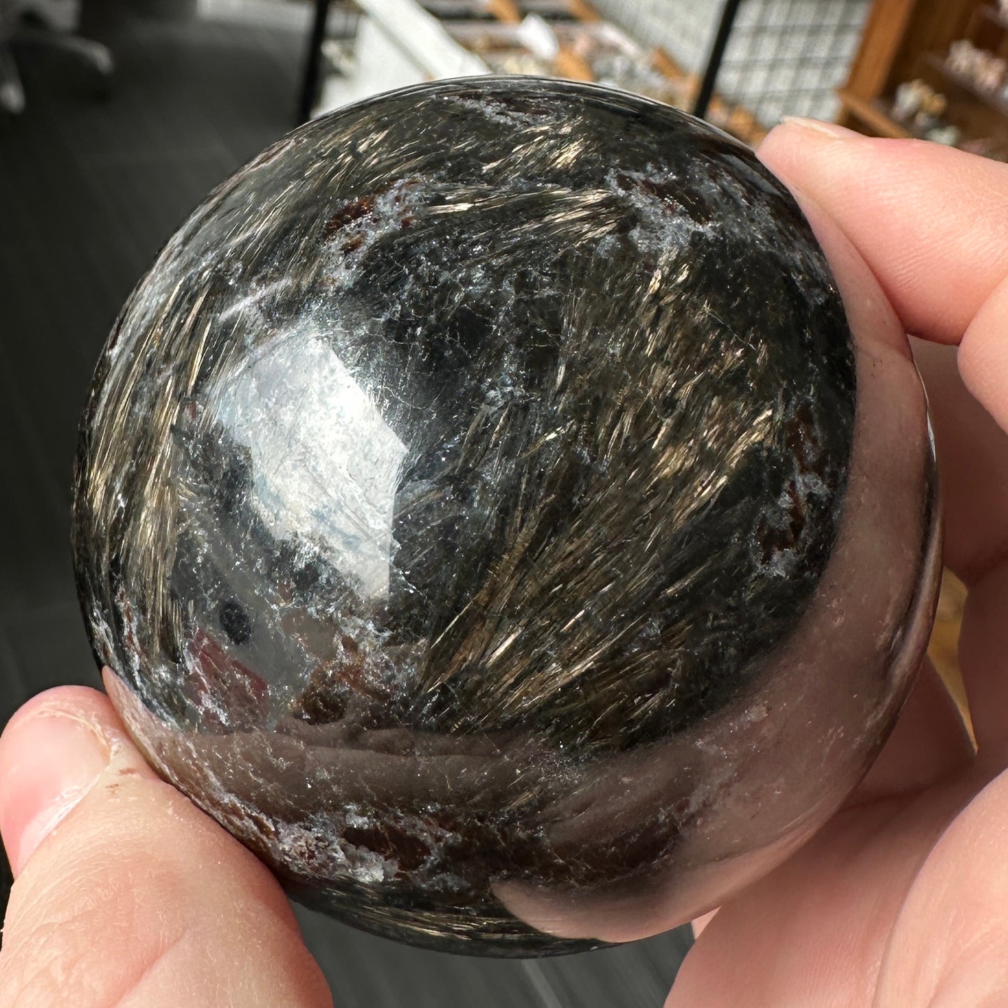 Radiant 6.80cm Astrophyllite and Garnet Sphere from India