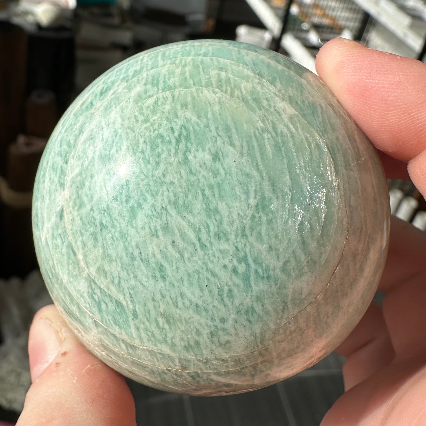 Vibrant 6.15cm Blue Green Amazonite Sphere from Brazil