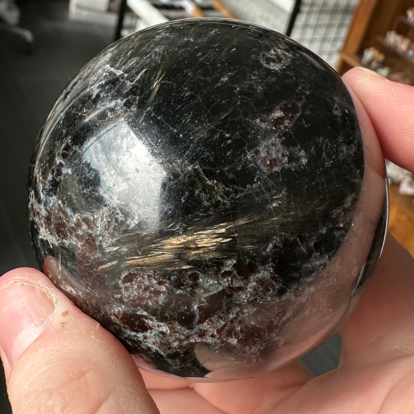 Radiant 6.80cm Astrophyllite and Garnet Sphere from India