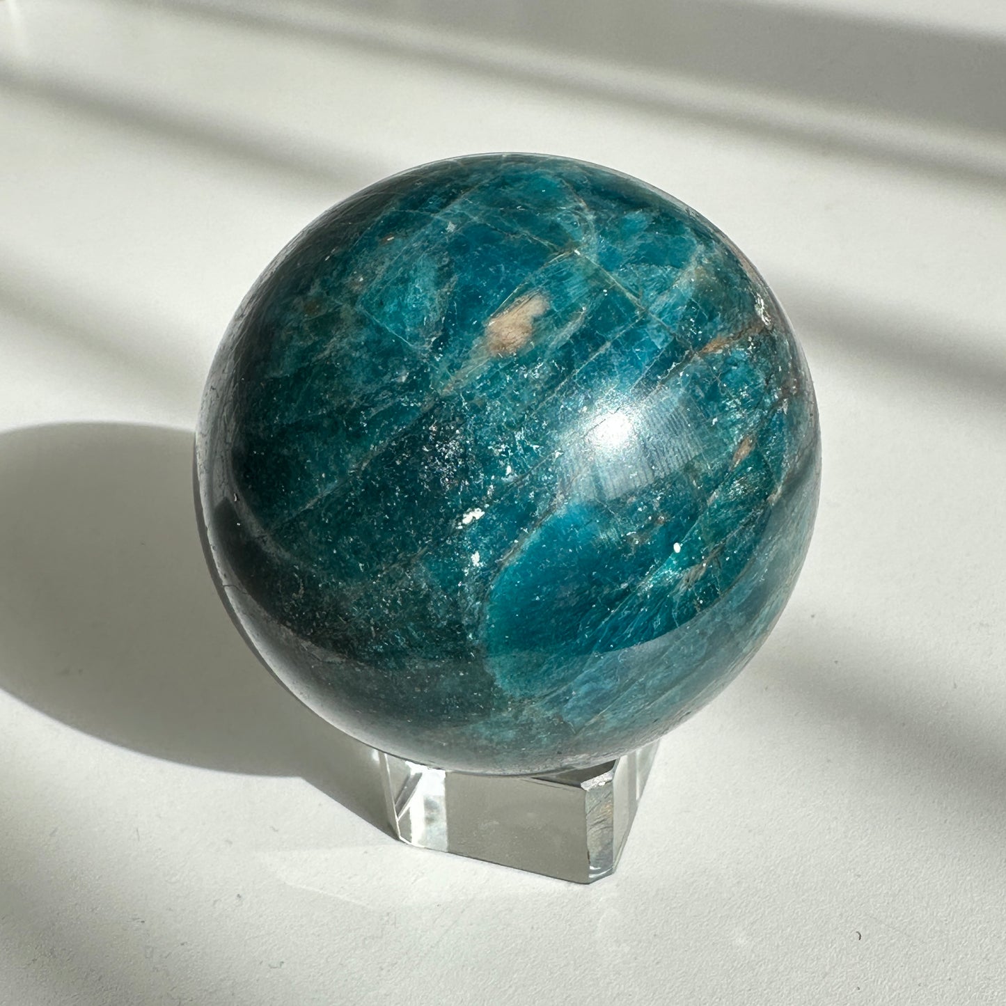 Stunning 5.50cm Cats Eye Electric Blue Apatite Sphere from Brazil
