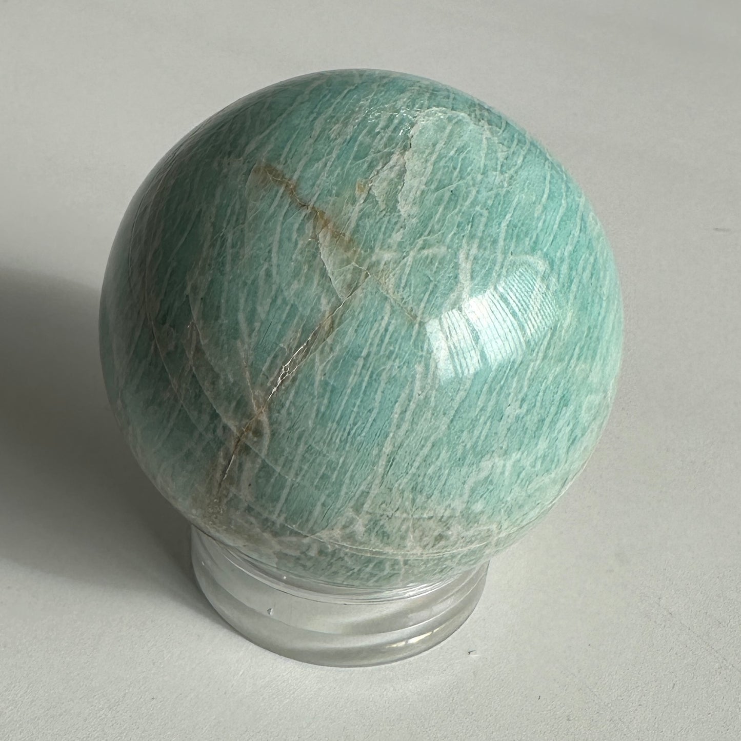 Vibrant 6.15cm Blue Green Amazonite Sphere from Brazil
